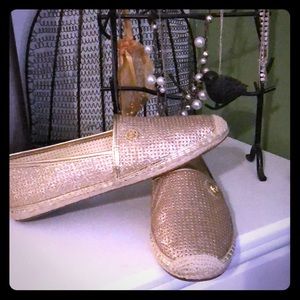 NWOB Gold “Kendrick Slip-ons” by Michael Kors Sz 9